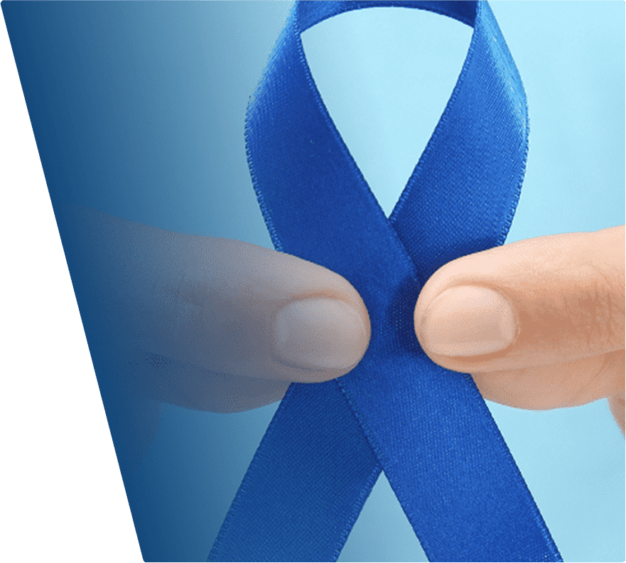 A close-up of two fingers holding a blue awareness ribbon against a light blue background.